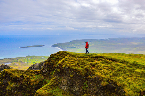 Man standing on top of mountain